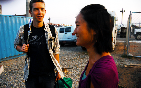 Yuan Huang, President of TCG, shows of the Main Campus Garden on 11th and Berks to a visitor